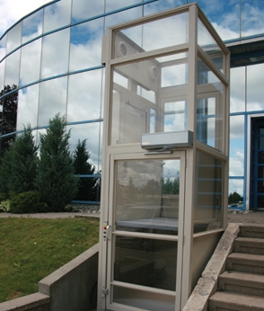 outdoor photo of savaria v-1504 vertical platform lift elevator outside building