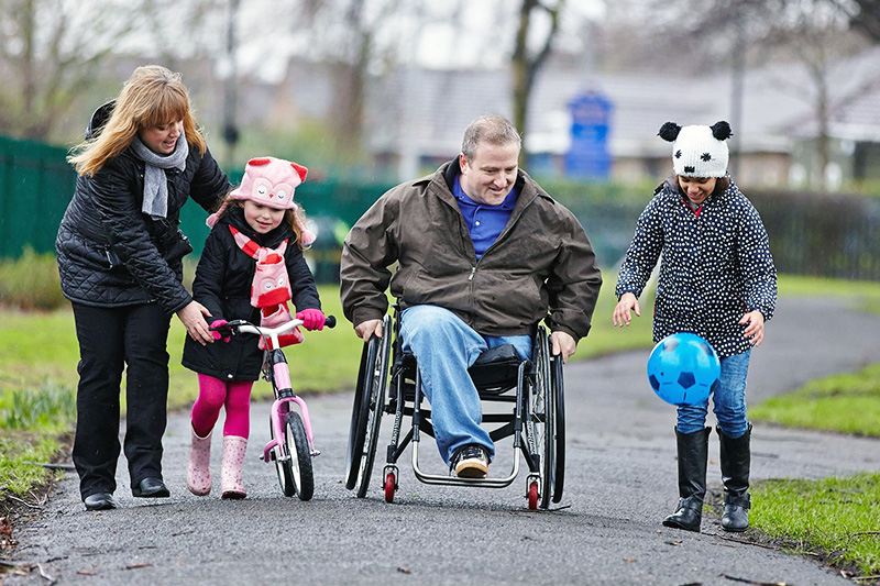 disabled-man-with-family disabled-man-with-family